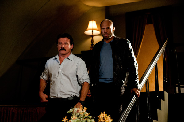 Scene from Hijacked with Randy Couture and Dominic Purcell